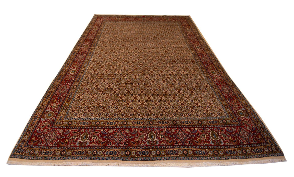 Moud rug with rust, dark blue and beige patterned field and decorative border