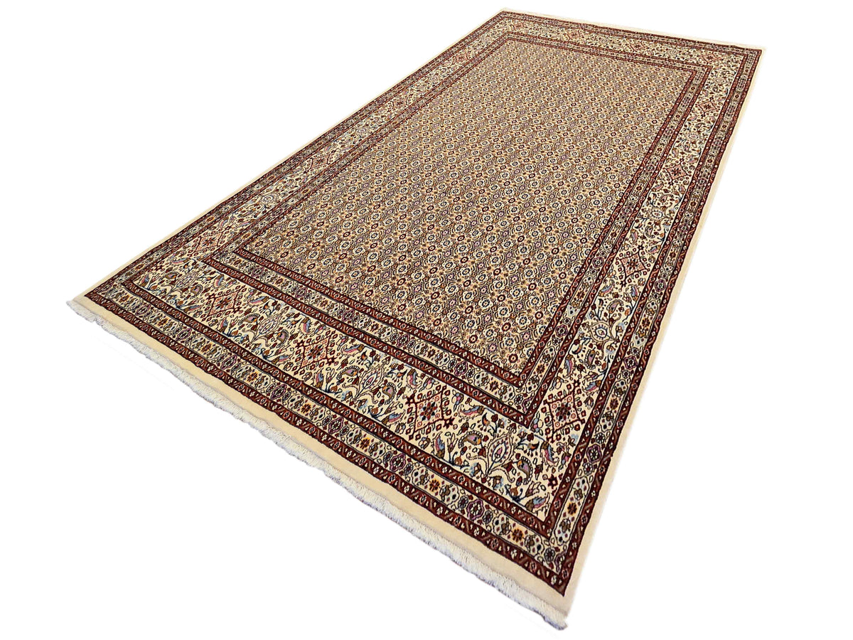 Persian area rug with ornate border and ivory center, rust red and dark blue detailing