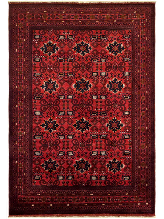 Red patterned rectangular area rug with central motif and decorative border