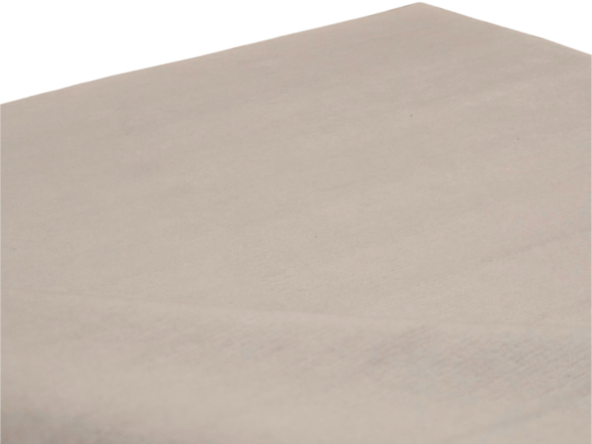 Light beige flatweave rug close-up with minimal pattern and even weave.