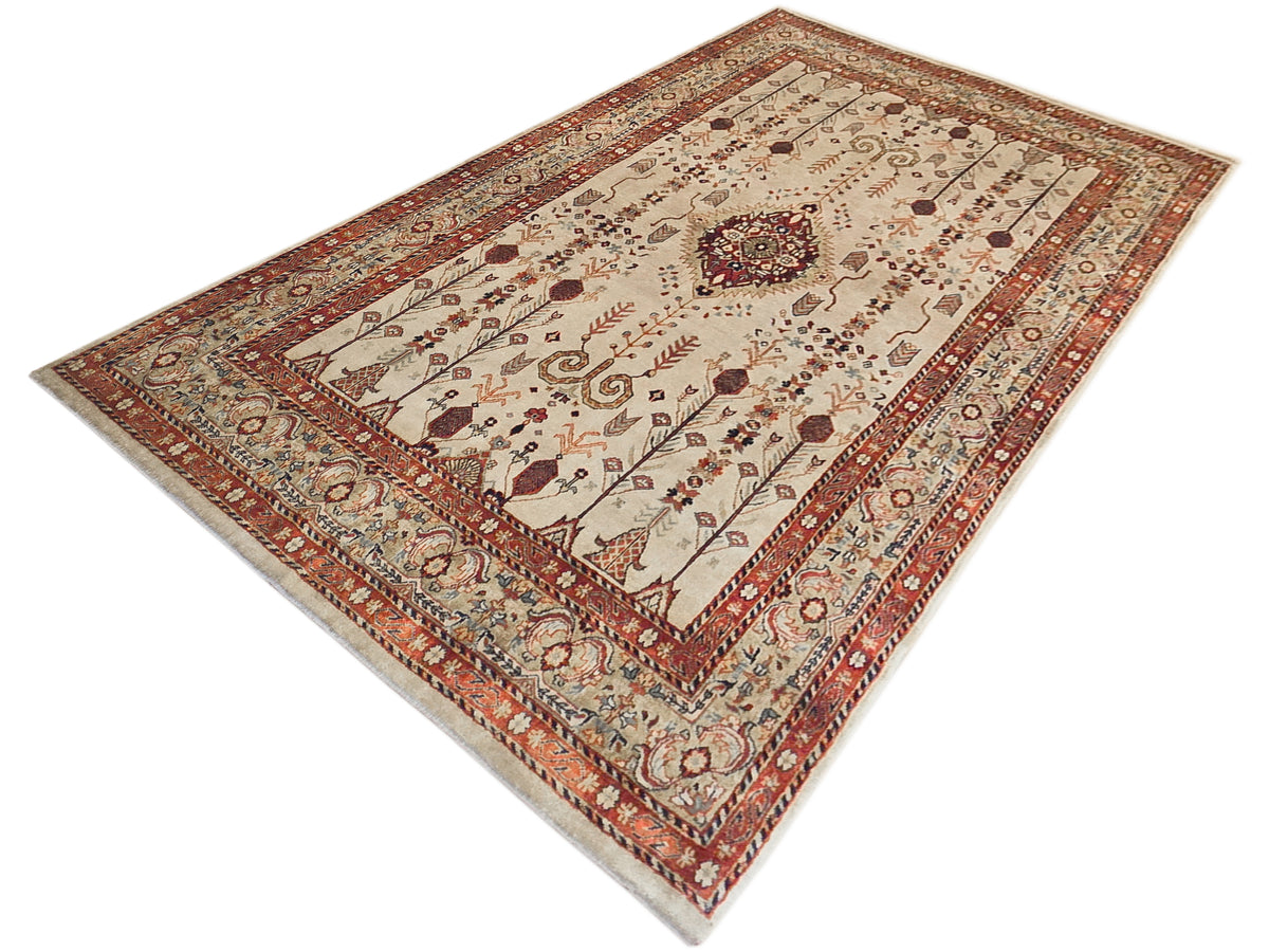 Angled rectangular rug with ivory field, rust border, and central ornament panel