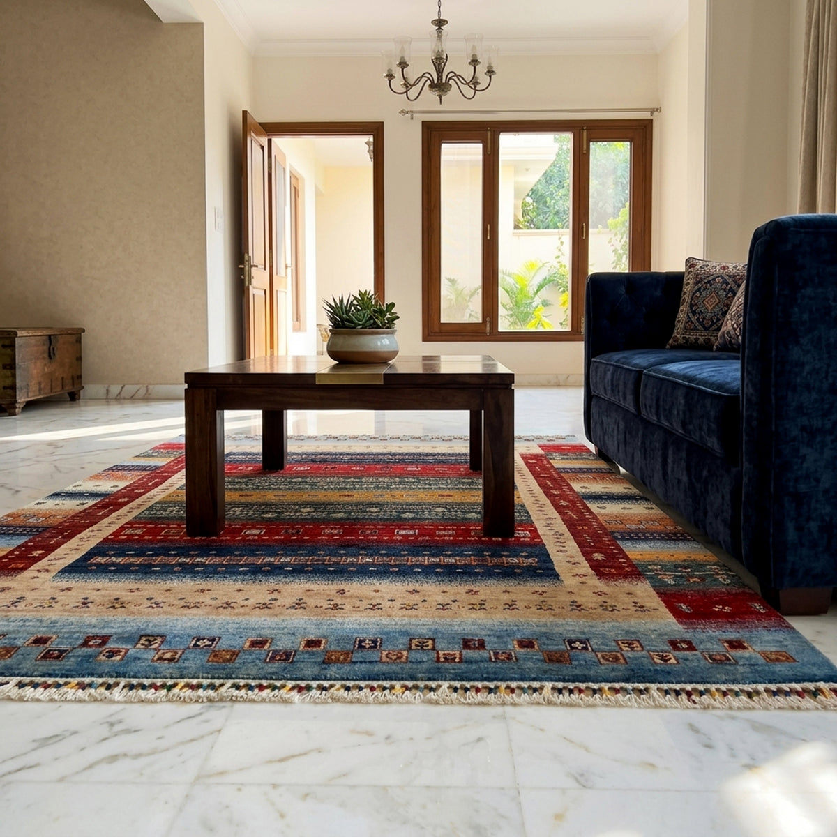 Multicolor patterned rug on the floor with red and blue bands and fringed edges.