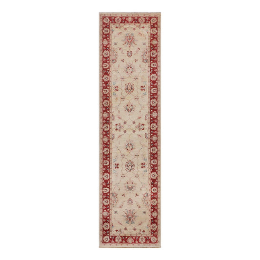 Cream runner rug with red border and floral medallion pattern.