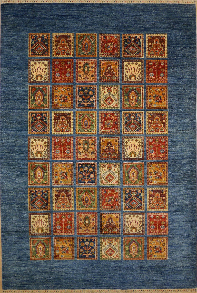 Blue and orange patchwork geometric area rug with repeating medallion squares